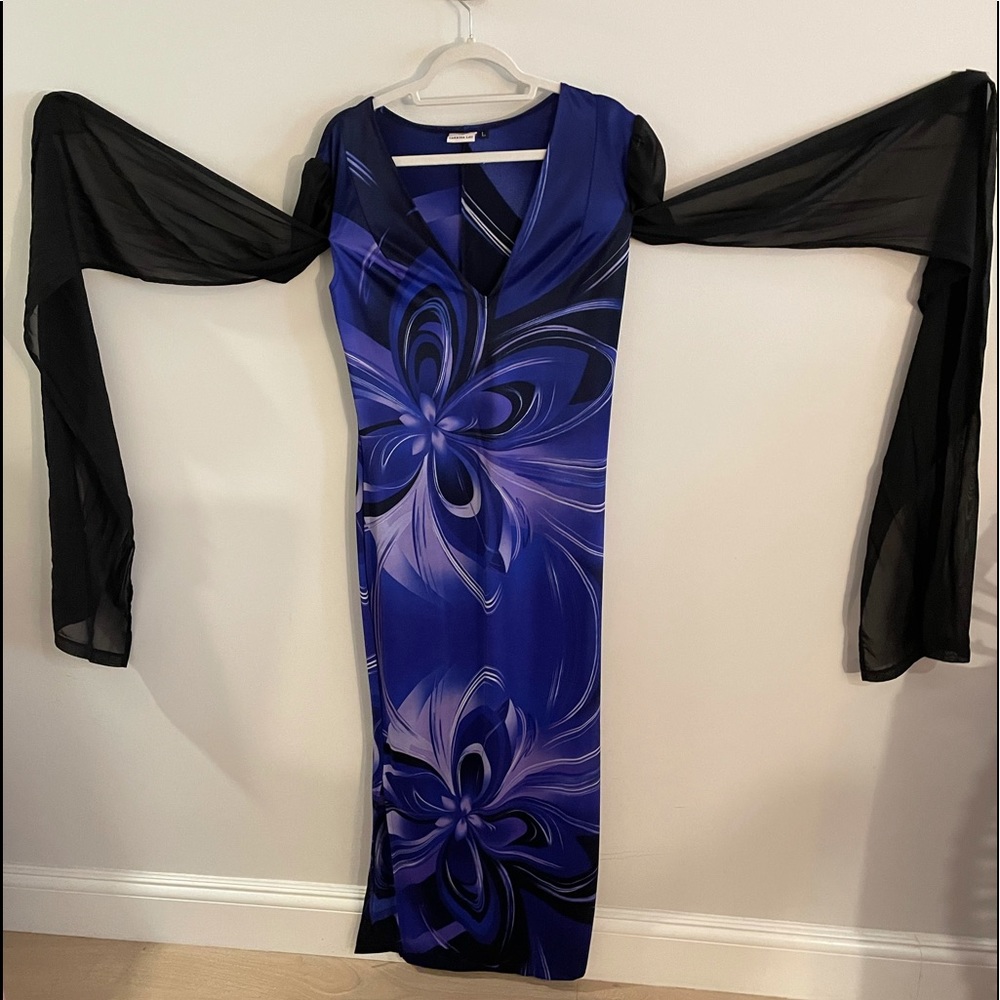 Blue long dress with long black “cape” sleeves